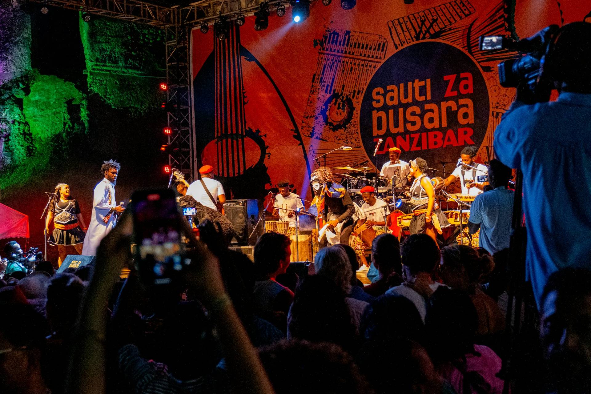 A band playing to a festival crowd